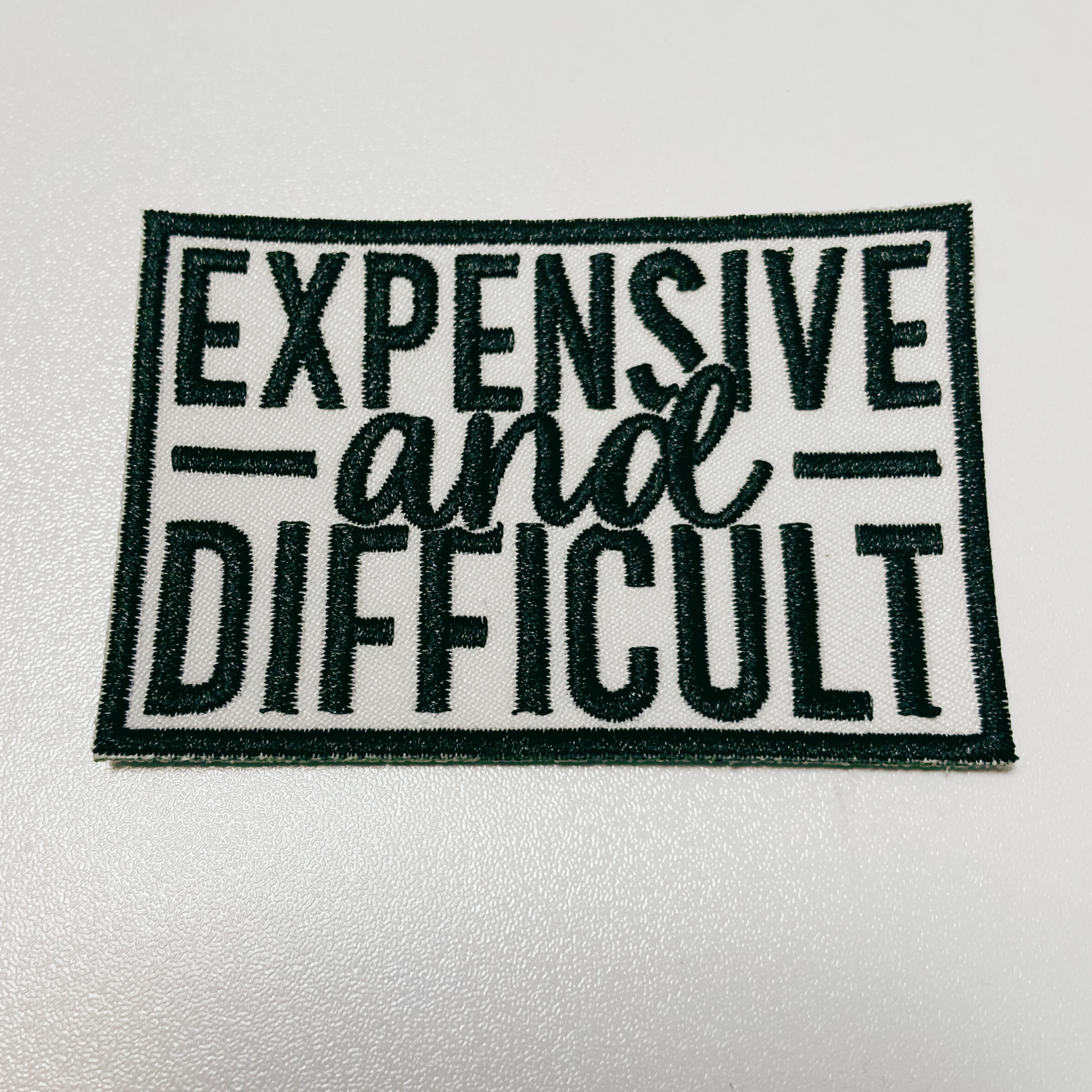 TEELUX - 3" Expensive & Difficult in Black -  Embroidered Hat Patch